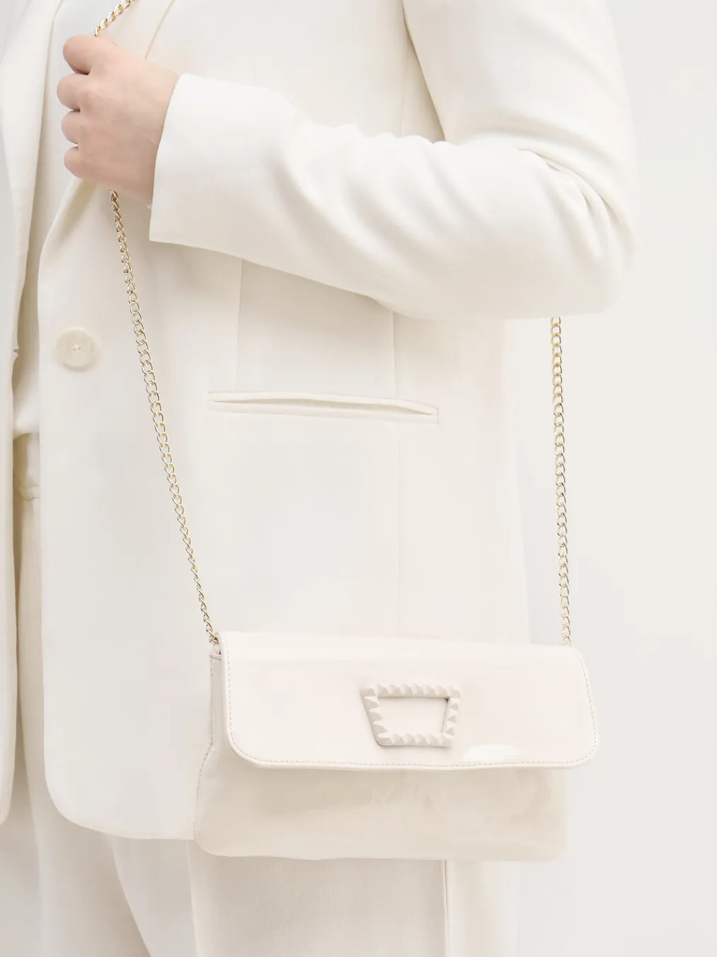 – Clutch aus Lackleder Elfenbein-Konstantin Starke